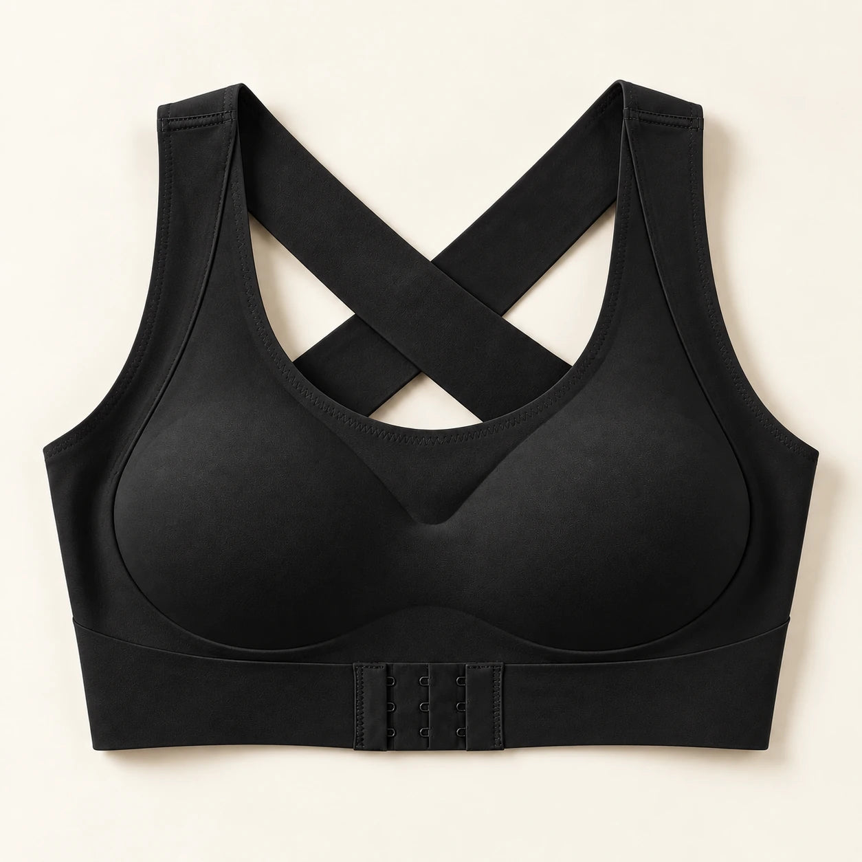 Black wireless bra with smooth cups and an adjustable front band.